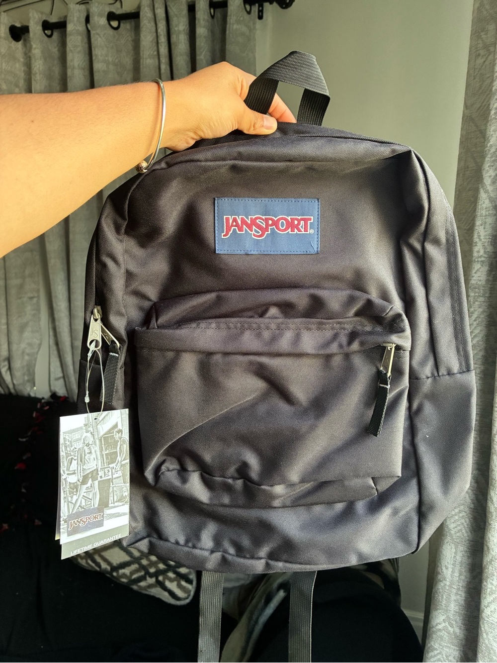 Jansport Classic Black Backpack with Red Logo